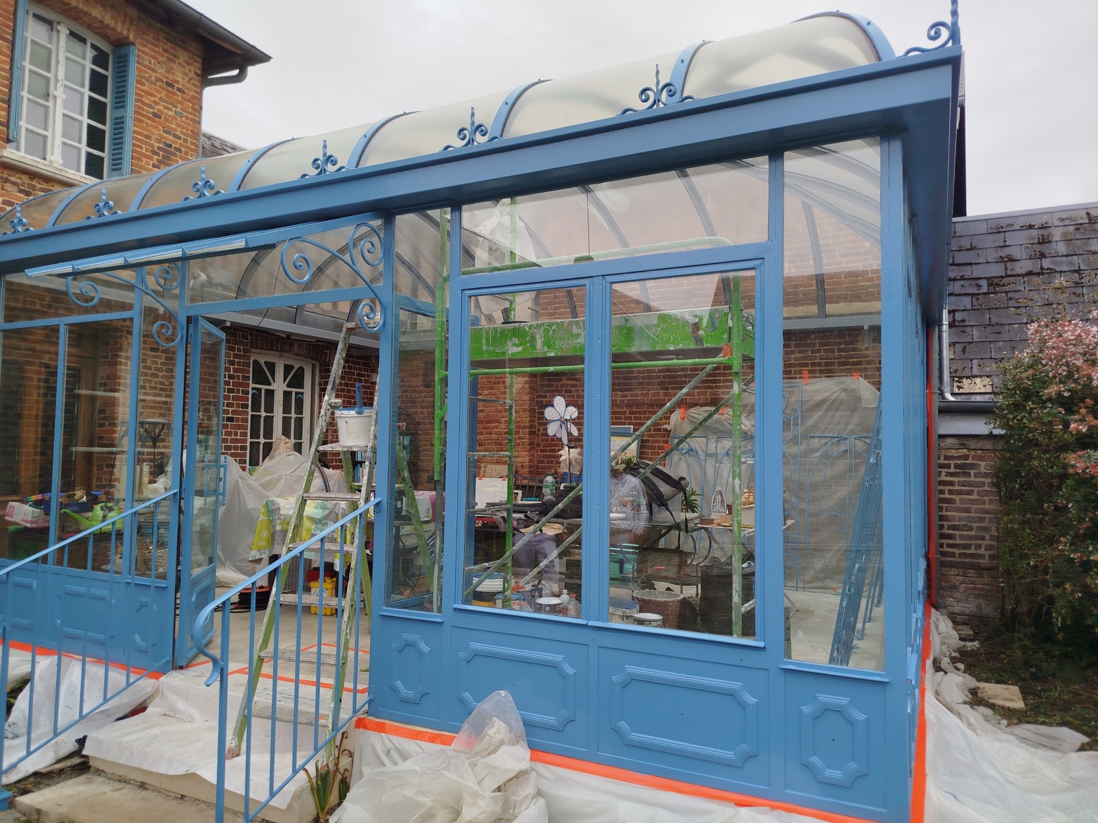 mise en peinture d'une véranda sur le secteur de Quincampoix 