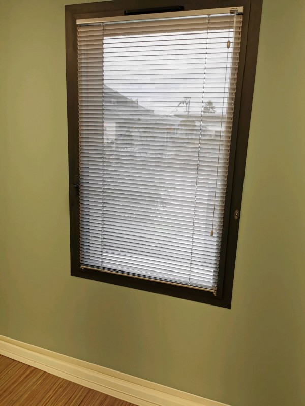 Pose de stores vénitiens à Isneauville 