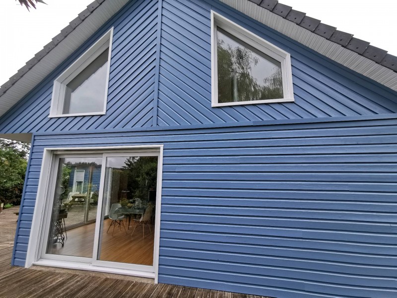 Réfection d'une façade en clin sur la commune de Saint-Jean du Cardonnay