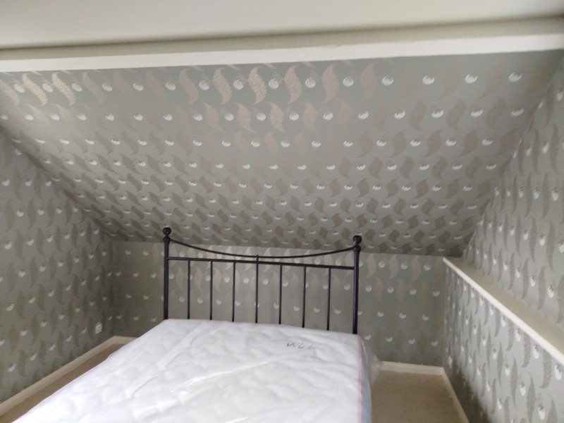 Pose de papier déco sur la commune d'Houppeville