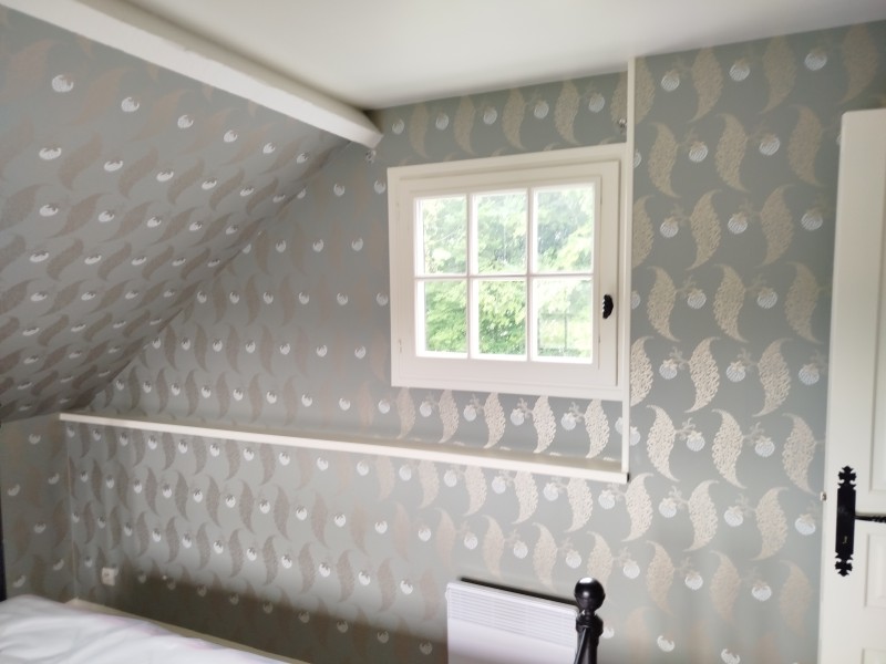 Pose de papier déco sur la commune d'Houppeville