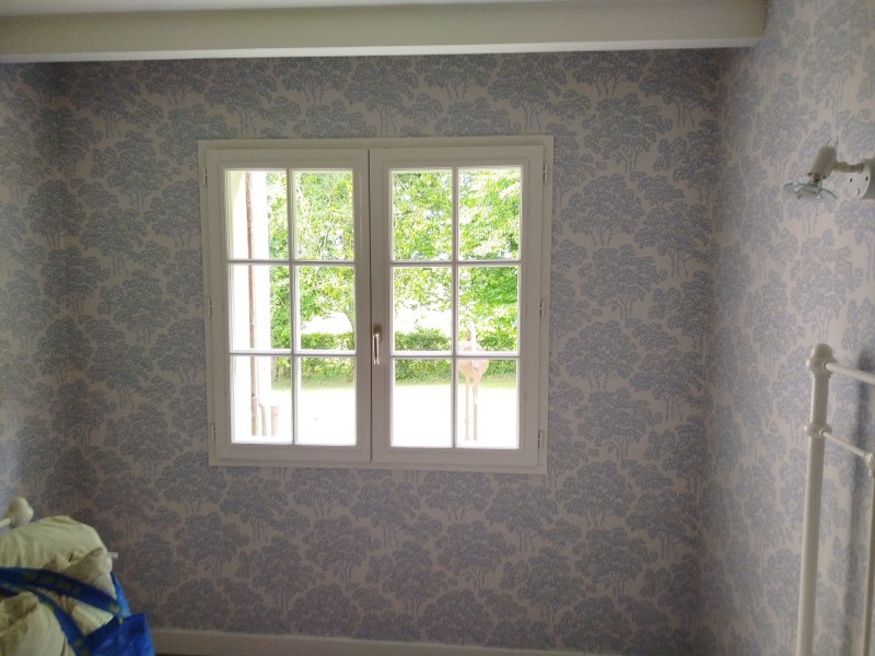 Pose de papier déco sur la commune d'Houppeville