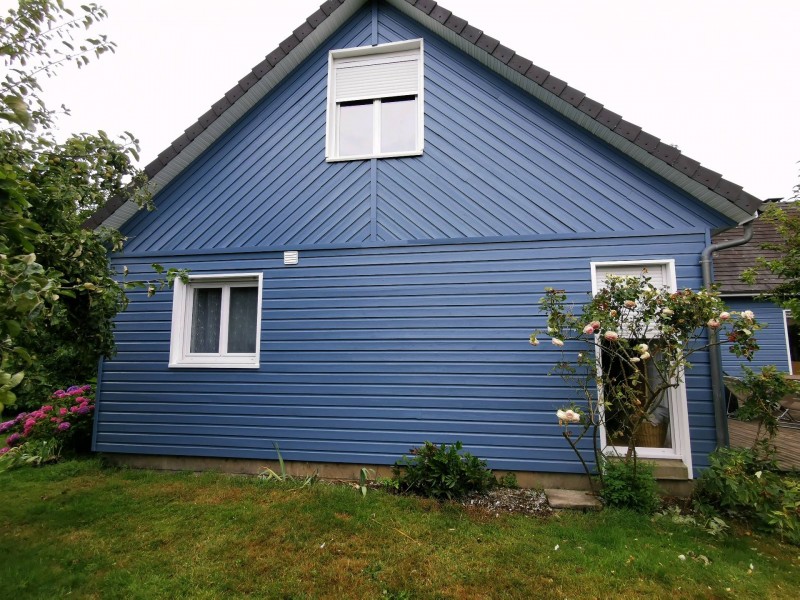 Réfection d'une façade en clin sur la commune de Saint-Jean du Cardonnay